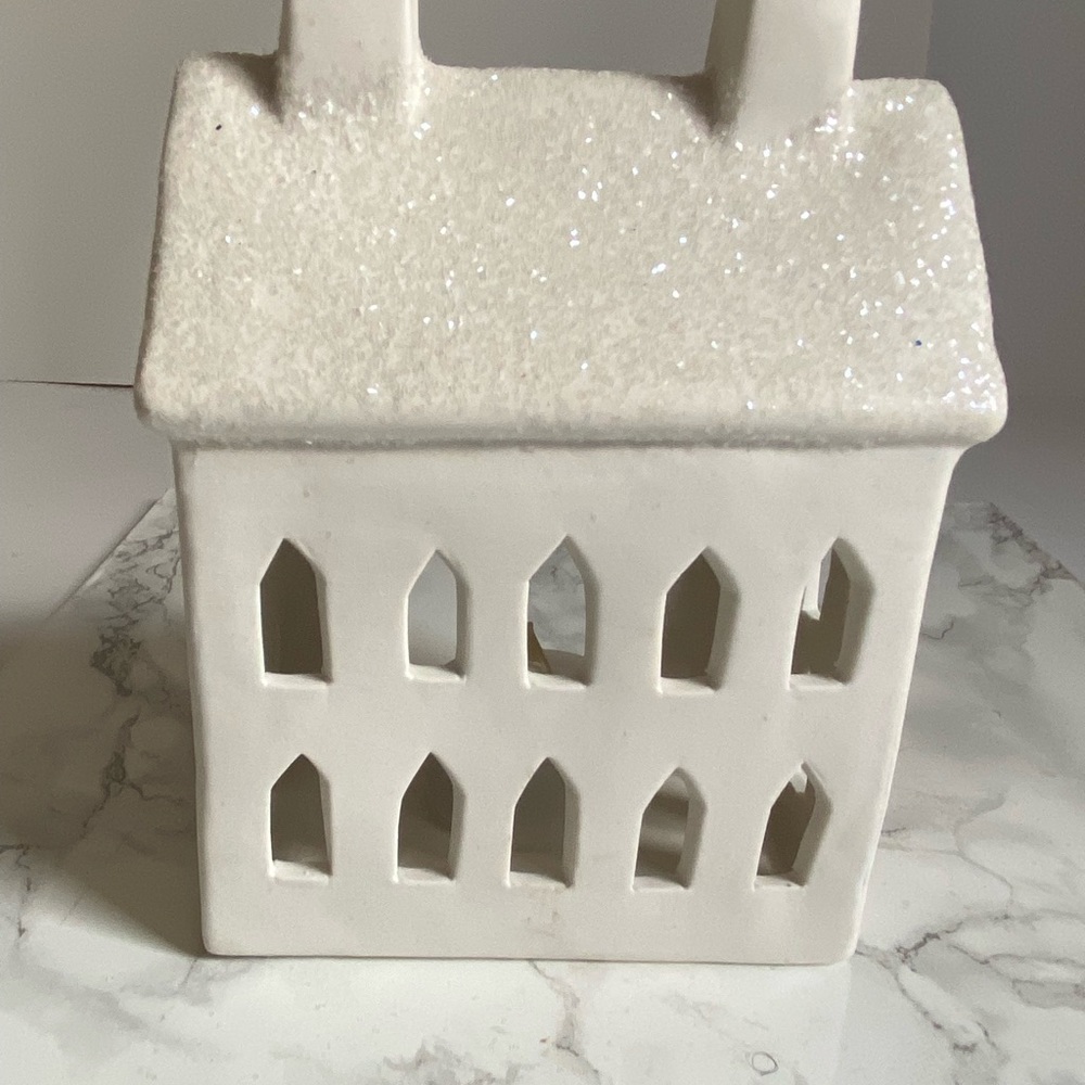 White ceramic house with glitter top. Use LED lights only .
